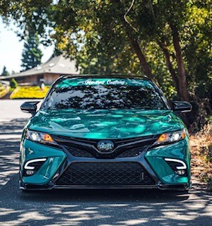 car wrapped in green front view